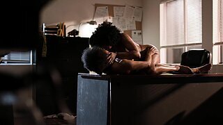 Two passionate black bitches fucking in the office